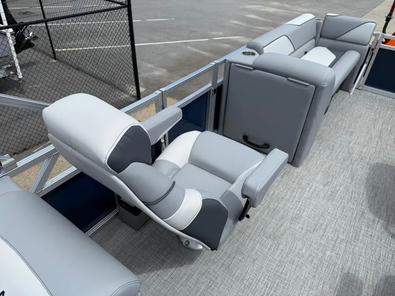 Slide: The Image of 2025 Avalon VENTURE QUAD LOUNGER with luxurious gray seating on a pontoon boat. - 35