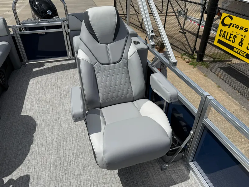 Slide: The Image of Luxurious seating on 2025 Avalon VENTURE QUAD LOUNGER boat, featuring sleek gray upholstery. - 45