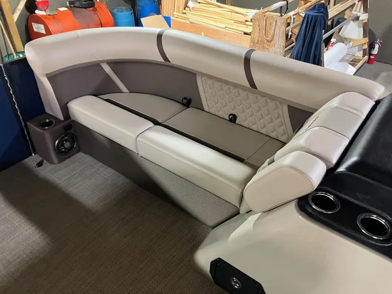 Slide: The Image of Luxurious seating in 2025 Crest 220 SLSC boat, featuring elegant upholstery and integrated speaker. - 9