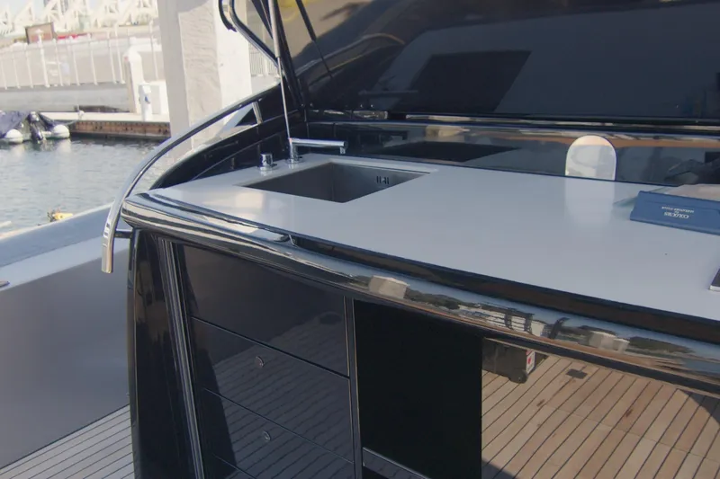 Slide: The Image of 2014 SACS Strider yacht with sleek outdoor kitchen and modern grill setup. - 17