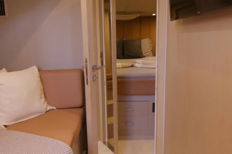 Slide: The Image of Interior view of 2014 SACS Strider yacht, featuring modern design and seating. - 19