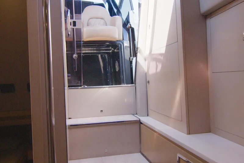 Slide: The Image of Interior cabinetry of 2014 SACS Strider yacht, featuring light wood and sleek design. - 20