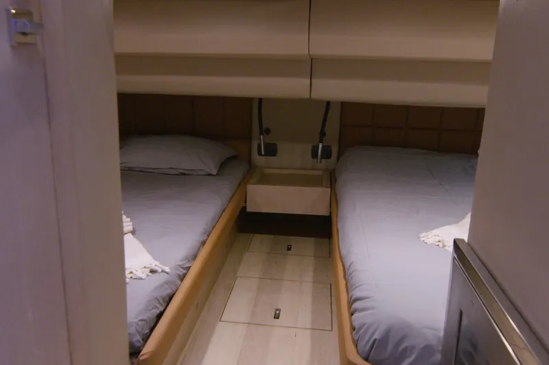 Slide: The Image of Luxurious cabin interior of 2014 SACS Strider yacht with cozy bedding. - 24