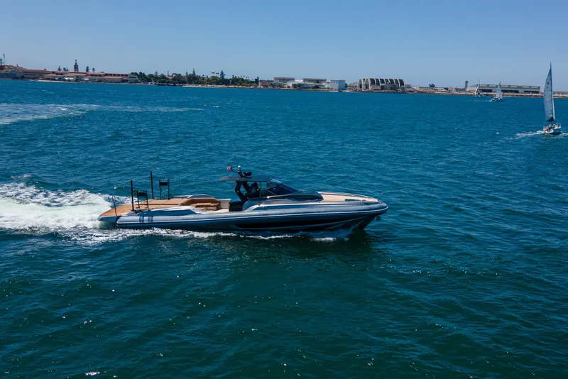 Slide: The Image of 2014 SACS Strider yacht cruising on blue ocean waters under clear skies. - 5