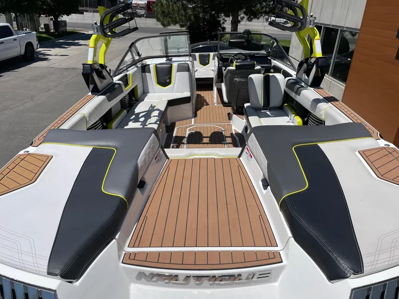 Slide: The Image of 2017 Nautique Super Air Nautique G25 boat interior with stylish seating and modern design. - 4