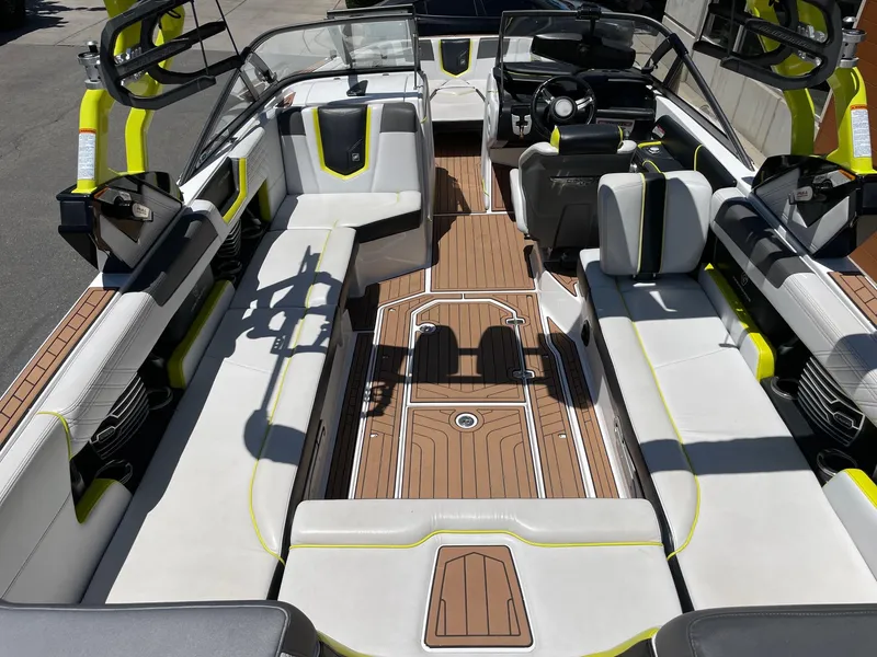 Slide: The Image of 2017 Nautique Super Air Nautique G25 interior with spacious seating and modern design. - 5