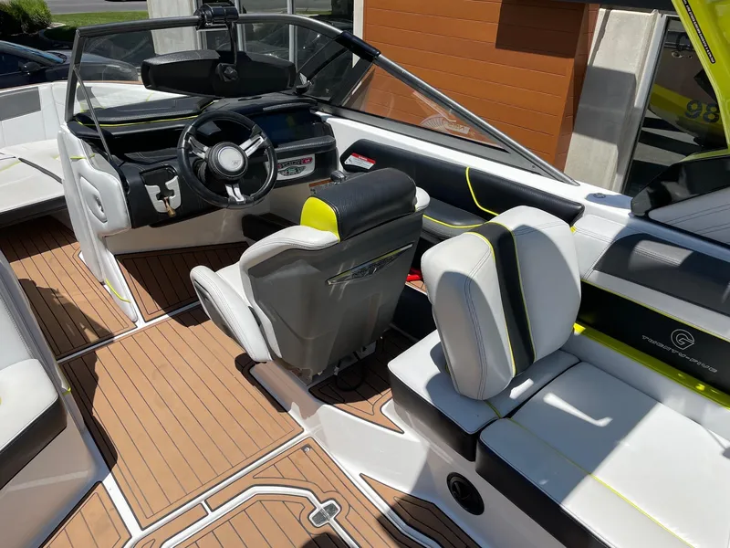 Slide: The Image of 2017 Nautique Super Air Nautique G25 interior with modern dashboard and seating. - 6