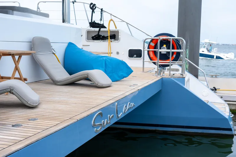 Slide: The Image of Luxury yacht deck with lounge chairs and a blue bean bag, Privilege 745, 2008 model. - 11