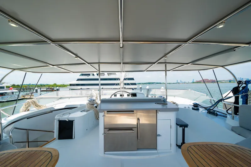 Slide: The Image of Luxurious 2008 Privilege 745 yacht deck with modern amenities and ocean view. - 16