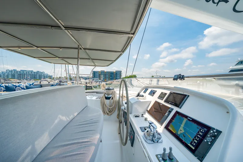 Slide: The Image of Luxury Privilege 745 yacht cockpit with navigation equipment, marina view, 2008 model. - 21