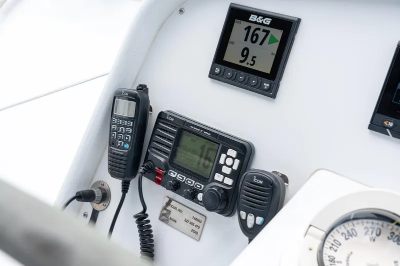 Slide: The Image of Control panel of a 2008 Privilege 745 yacht with communication and navigation equipment. - 27