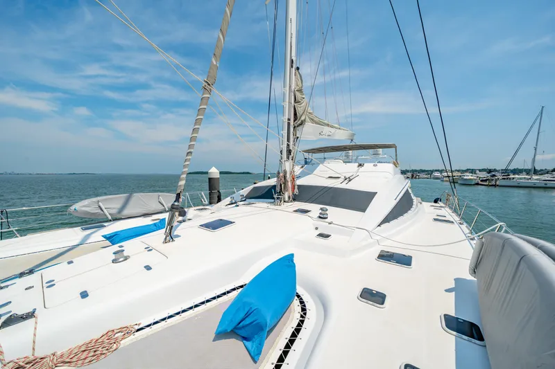 Slide: The Image of Luxury Privilege 745 yacht deck with blue cushions, sailing on a sunny day, 2008 model. - 31