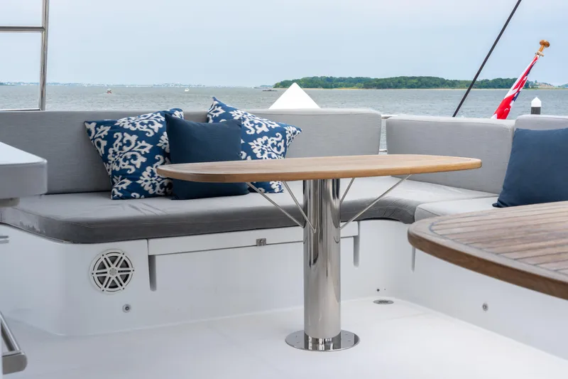 Slide: The Image of Luxury seating area on 2008 Privilege 745 yacht with stylish cushions and table. - 37