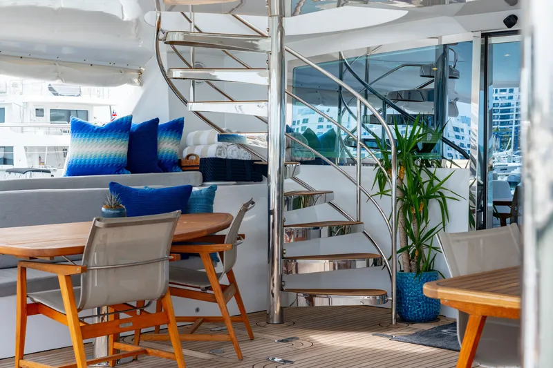 Slide: The Image of Luxurious 2008 Privilege 745 yacht interior with spiral staircase, seating, and decor. - 41