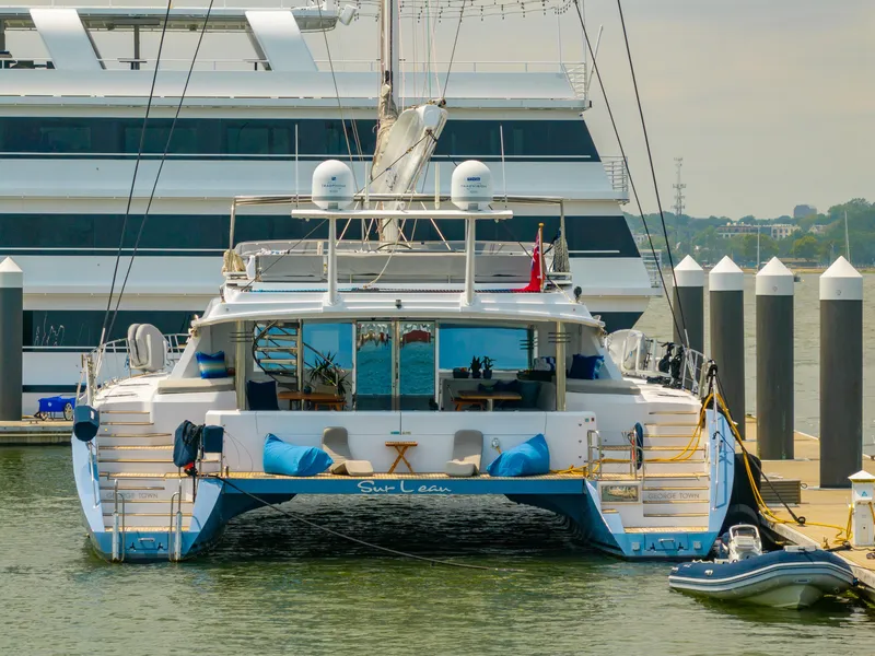 Slide: The Image of Luxury Privilege 745 yacht docked at marina, 2008 model, with modern amenities and sleek design. - 7