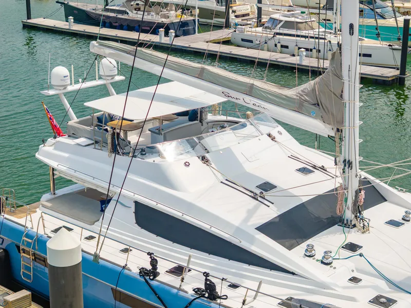 Slide: The Image of Luxury Privilege 745 yacht docked at marina, 2008 model, sleek design, spacious deck. - 9