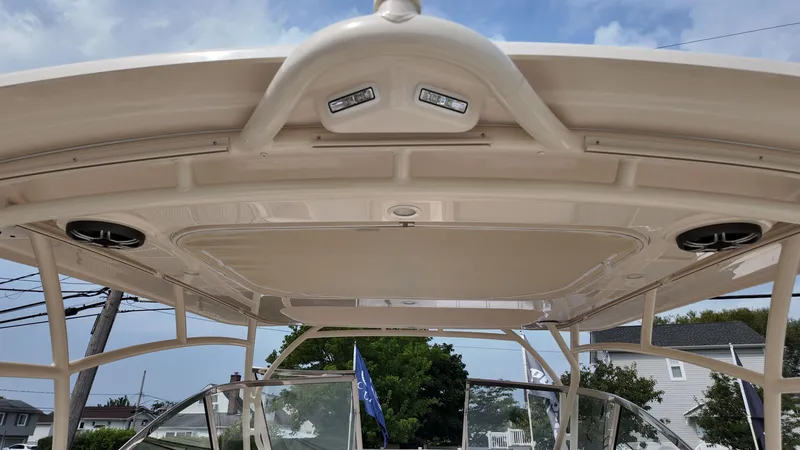 Slide: The Image of 2026 Grady-White Freedom 285 boat canopy with integrated speakers and lighting. - 15