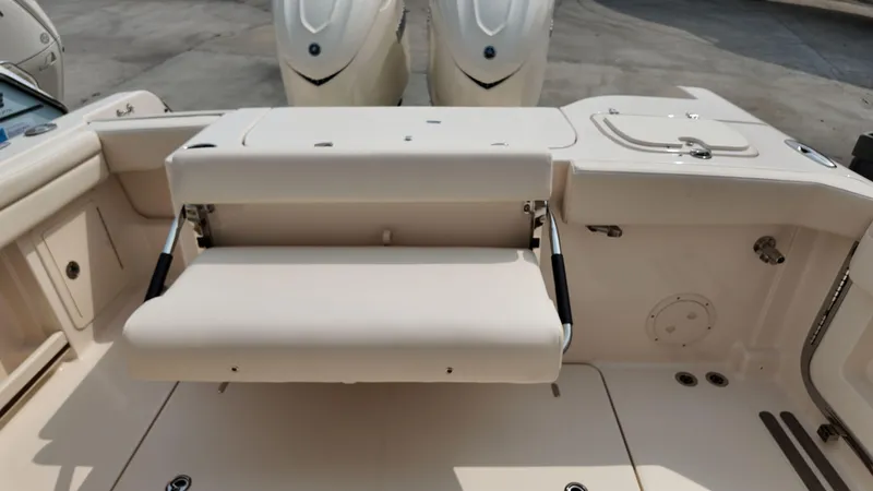 Slide: The Image of 2026 Grady-White Freedom 285 boat with foldable seating and dual outboard engines. - 5