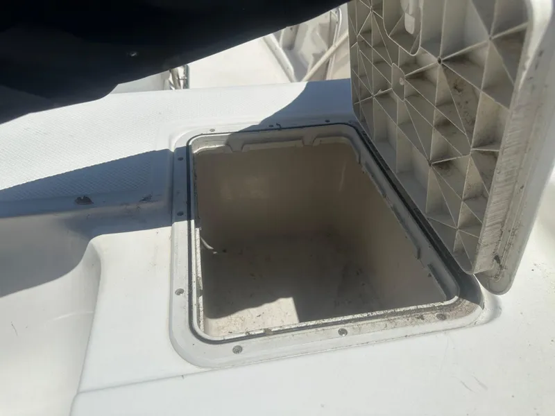Slide: The Image of Open storage compartment on 2009 Key West 176 Bay Reef boat. - 12