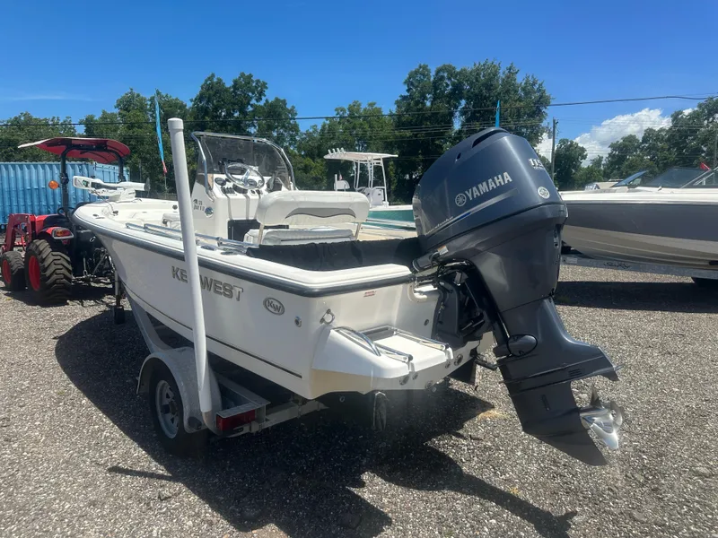 Slide: The Image of 2009 Key West 176 Bay Reef boat with Yamaha outboard motor on trailer. - 4