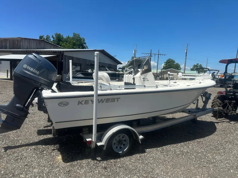 Slide: The Image of 2009 Key West 176 Bay Reef boat on trailer with Yamaha outboard motor. - 6