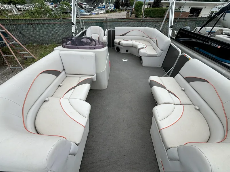 Slide: The Image of 2018 SunCatcher V16 Cruise pontoon boat interior with spacious seating and modern design. - 10