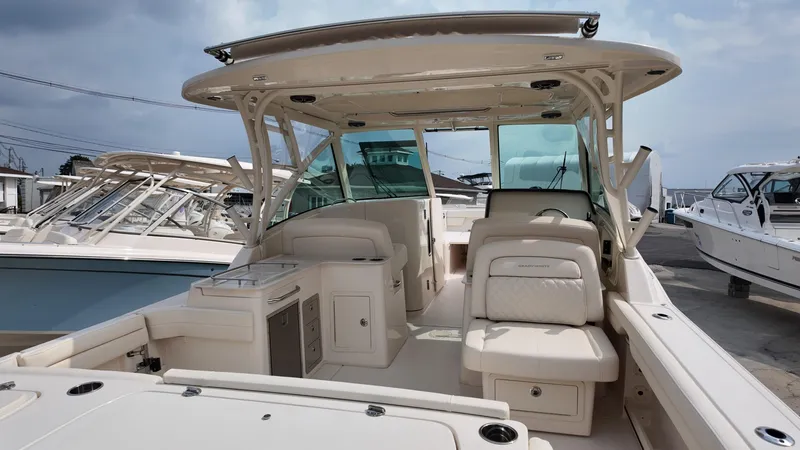Slide: The Image of 2026 Grady-White Freedom 325 boat interior, featuring spacious seating and modern amenities. - 5
