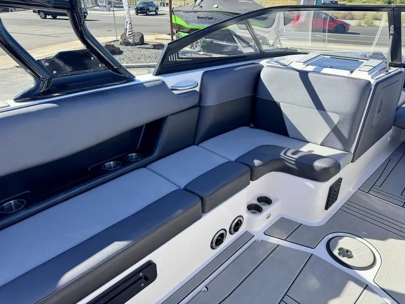 Slide: The Image of 2020 Moomba Max boat interior with sleek seating and modern design. - 14