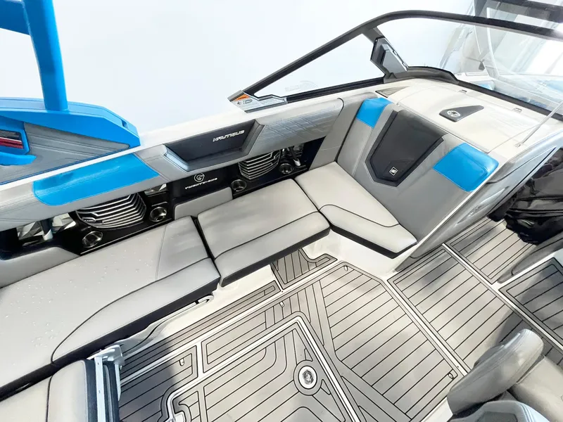 Slide: The Image of 2020 Nautique G21 interior with sleek seating and modern design elements. - 7
