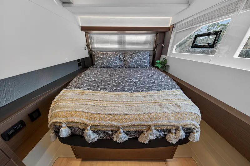 Slide: The Image of Luxurious bedroom interior of 2022 Leopard 53 Powercat yacht with cozy bedding and modern design. - 103