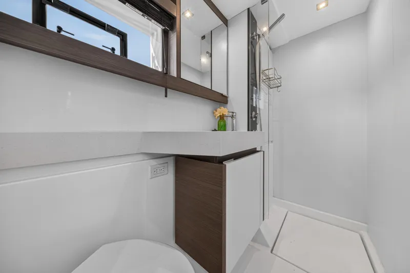 Slide: The Image of Modern bathroom interior on 2022 Leopard 53 Powercat yacht, featuring sleek design and fixtures. - 105