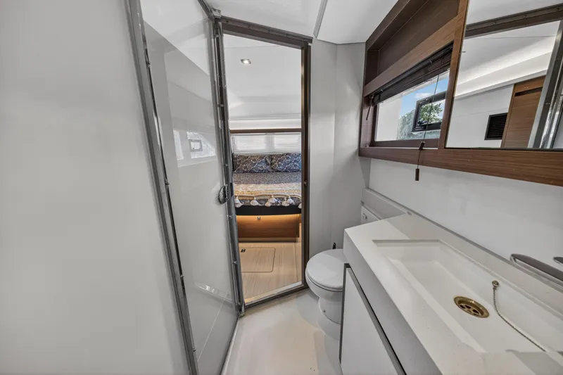 Slide: The Image of Modern bathroom interior on 2022 Leopard 53 Powercat yacht, featuring sleek design and amenities. - 106
