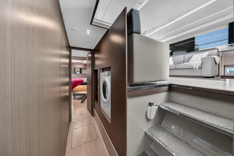 Slide: The Image of Interior of 2022 Leopard 53 Powercat yacht with modern design and laundry area. - 107