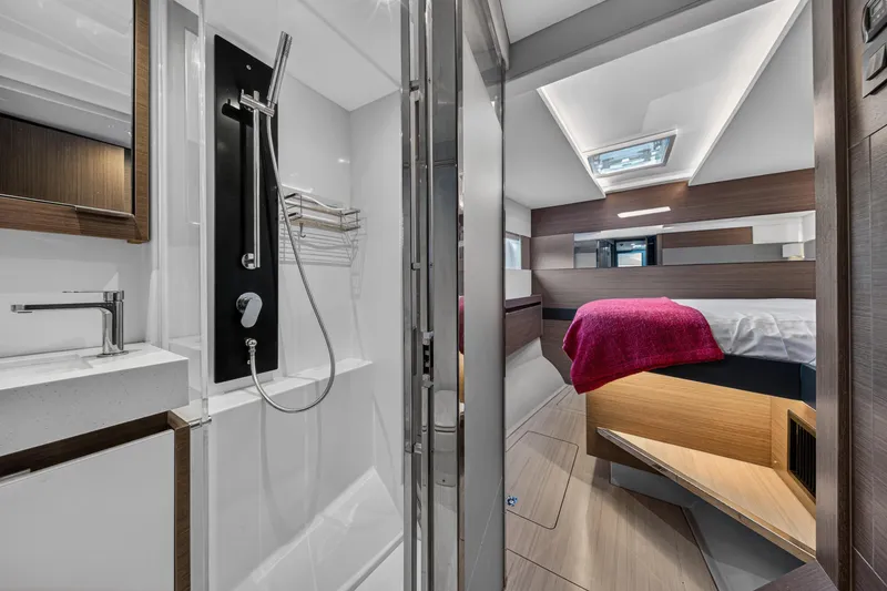 Slide: The Image of Luxurious interior of 2022 Leopard 53 Powercat featuring modern bathroom and cozy bedroom. - 109