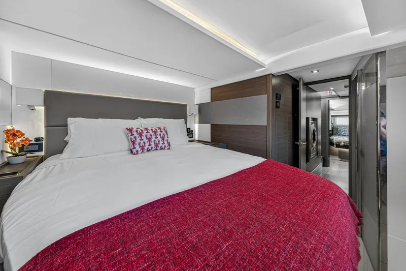 Slide: The Image of Luxurious bedroom interior of 2022 Leopard 53 Powercat yacht with modern design and vibrant accents. - 111