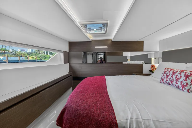 Slide: The Image of Luxurious bedroom interior of 2022 Leopard 53 Powercat yacht with modern design and large window. - 112