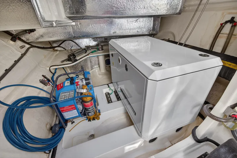 Slide: The Image of Engine room of 2022 Leopard 53 Powercat with equipment and wiring. - 118