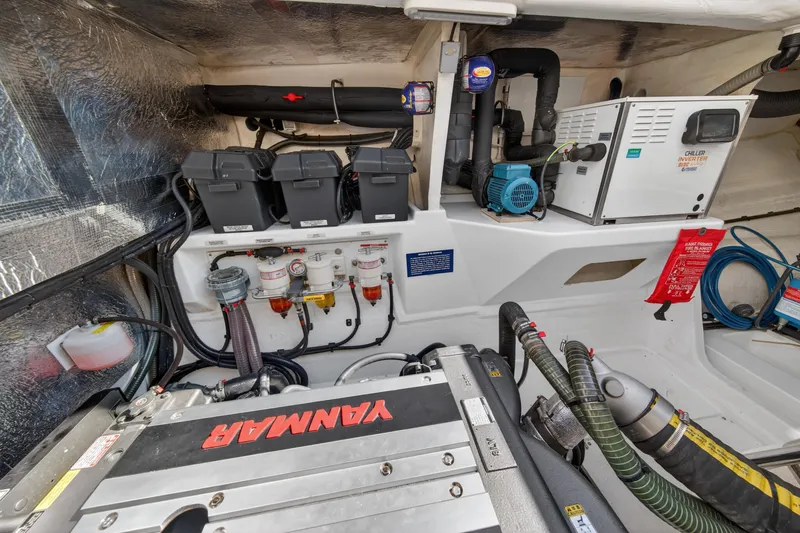 Slide: The Image of Engine room of 2022 Leopard 53 Powercat with Yanmar engine and electrical components. - 120