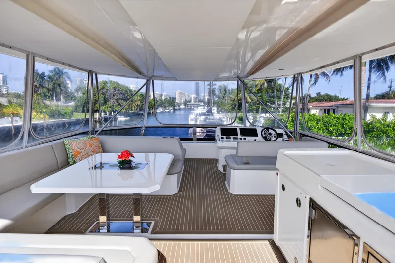 Slide: The Image of Luxurious interior of 2022 Leopard 53 Powercat yacht with elegant seating and scenic views. - 21