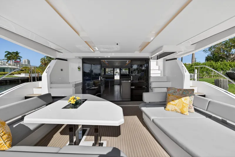 Slide: The Image of Luxurious 2022 Leopard 53 Powercat yacht interior with elegant seating and modern design. - 32