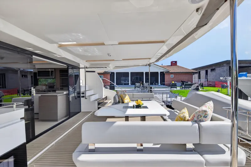 Slide: The Image of Luxurious 2022 Leopard 53 Powercat yacht with spacious outdoor seating and modern interior design. - 35