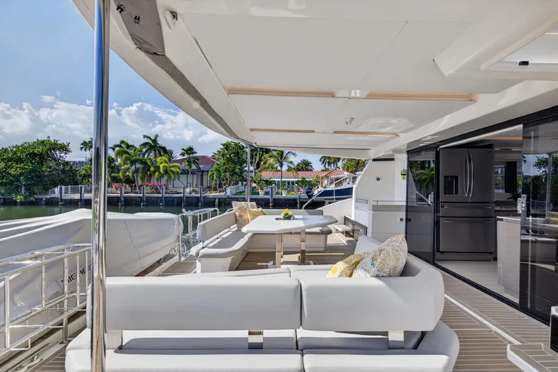 Slide: The Image of Luxurious 2022 Leopard 53 Powercat yacht with spacious outdoor seating and modern amenities. - 39