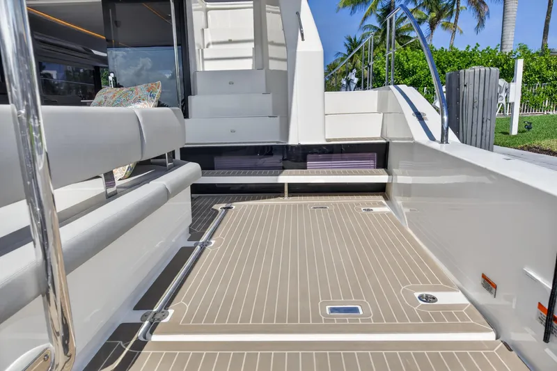 Slide: The Image of Leopard 53 Powercat 2022 yacht deck with seating and modern design. - 45