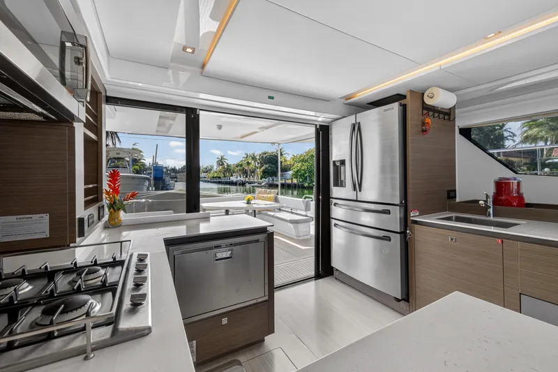 Slide: The Image of Modern kitchen interior of 2022 Leopard 53 Powercat yacht with stainless steel appliances. - 58