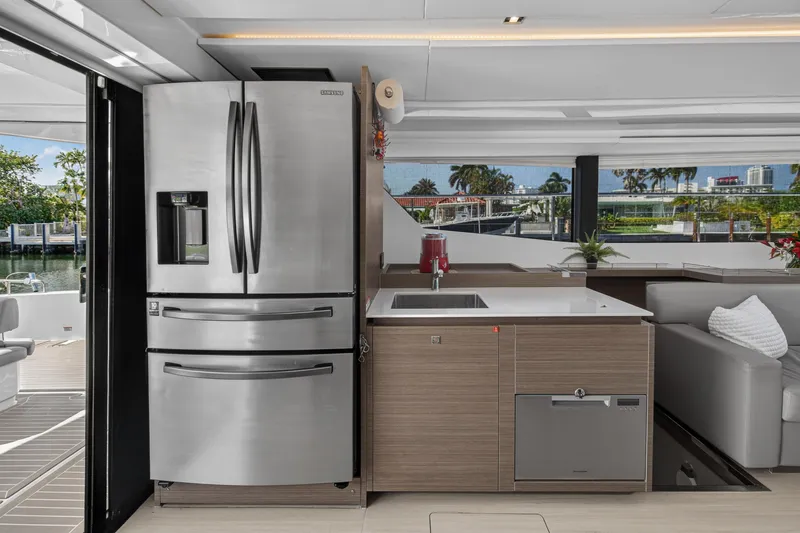 Slide: The Image of Modern kitchen interior on 2022 Leopard 53 Powercat yacht with stainless steel appliances. - 60