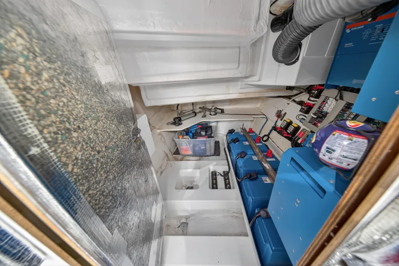 Slide: The Image of Engine room of 2022 Leopard 53 Powercat with batteries and electrical systems. - 63