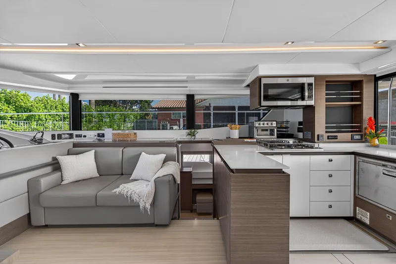 Slide: The Image of Luxurious interior of 2022 Leopard 53 Powercat yacht with modern kitchen and seating area. - 65