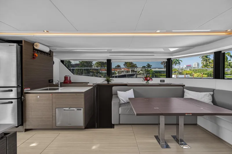 Slide: The Image of Luxurious interior of 2022 Leopard 53 Powercat yacht with modern kitchen and dining area. - 66