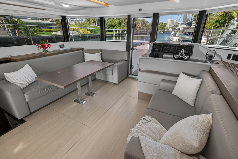 Slide: The Image of Luxurious interior of 2022 Leopard 53 Powercat yacht with modern seating and helm. - 69