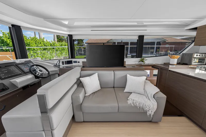 Slide: The Image of Luxurious interior of 2022 Leopard 53 Powercat yacht with modern helm and cozy seating. - 71